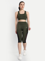 Model standing front facing in Waylene's olive green capri tights and matching sports bra, designed for yoga and gym, highlighting the smooth fabric and comfortable fit.