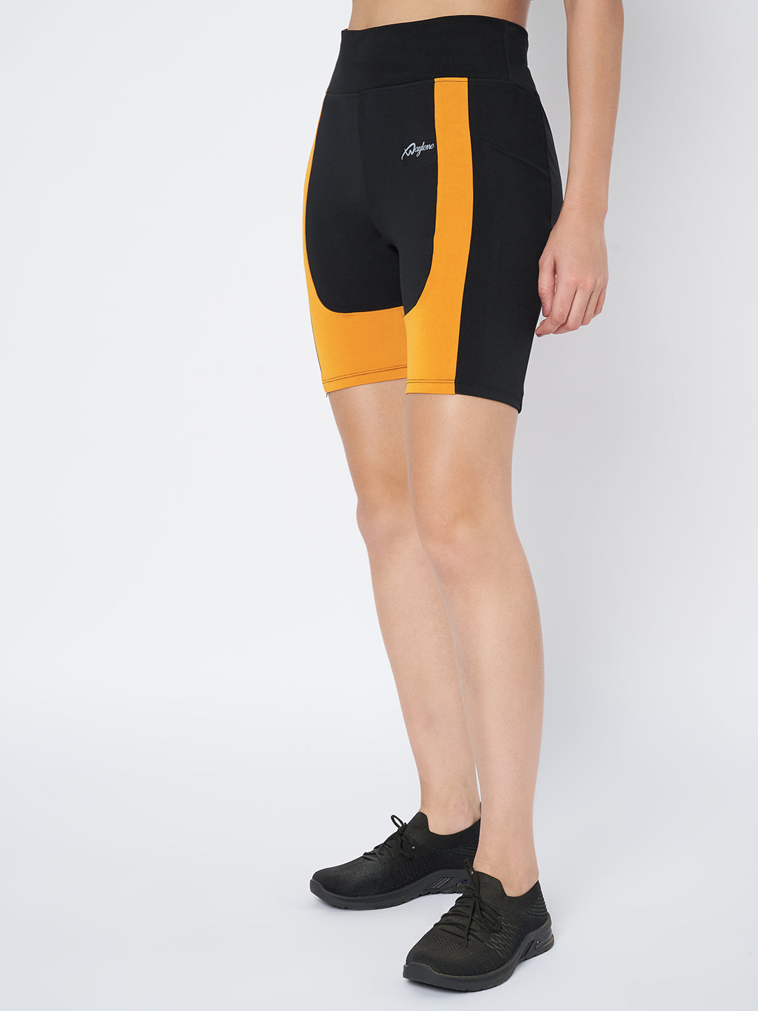 Side perspective of Waylene's black and orange high-waist sports shorts, showing the sleek design and quality stitching, ideal for athletic pursuits.