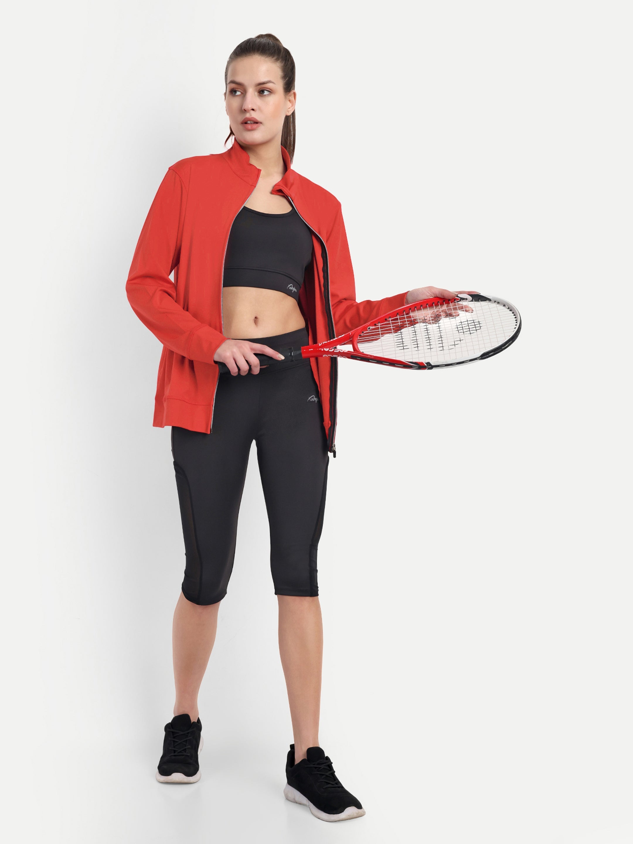 Waylene Red Training Jacket styled for tennis with black leggings and sneakers