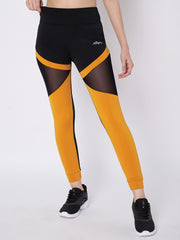Waylene black and orange sports leggings with mesh panels, front view