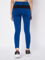 Waylene blue and black sports leggings, back view highlighting color block pattern and waistband.