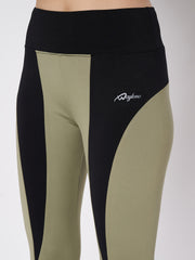 Close-up of Waylene leggings showing olive green and black color block and logo detail
