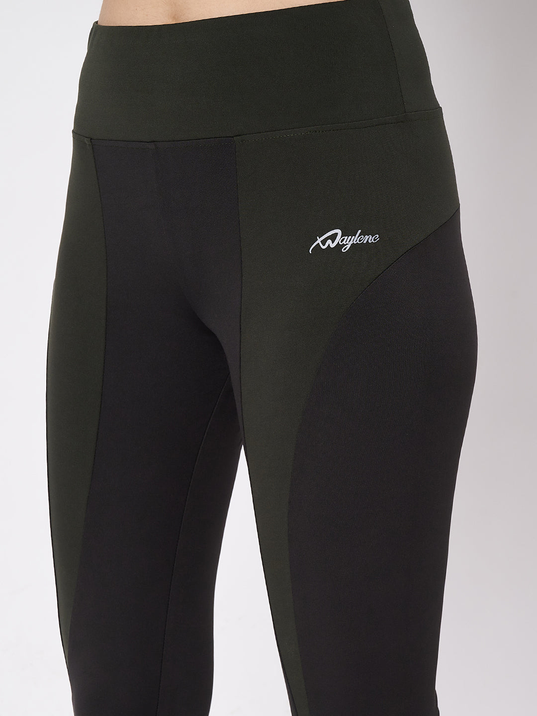 Close-up of Waylene black and olive leggings with logo detail