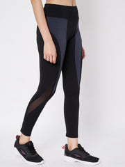 Waylene Side View of Black and Gray Leggings Featuring Mesh Inserts