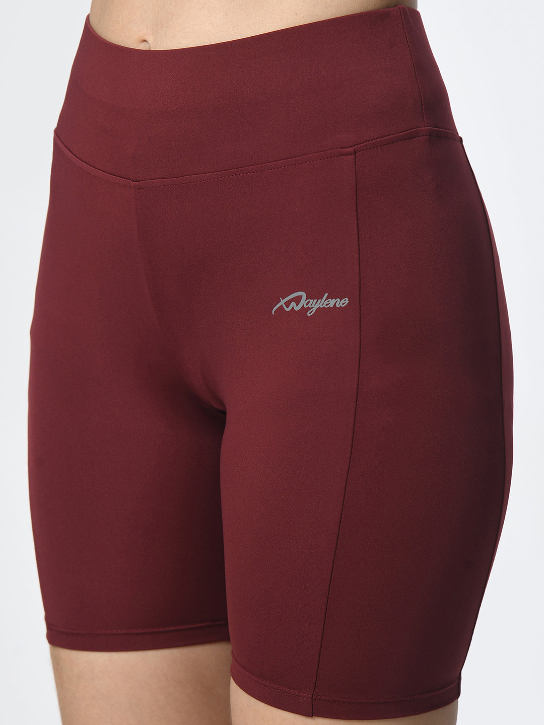 Close-up of Waylene wine-colored high-performance shorts with pocket, women's activewear.