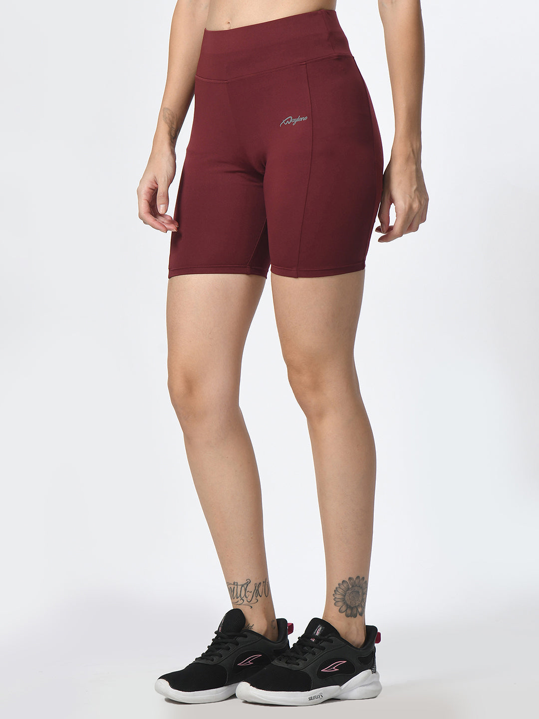 Angled view of Waylene wine-colored high-performance shorts with pocket, women's activewear.