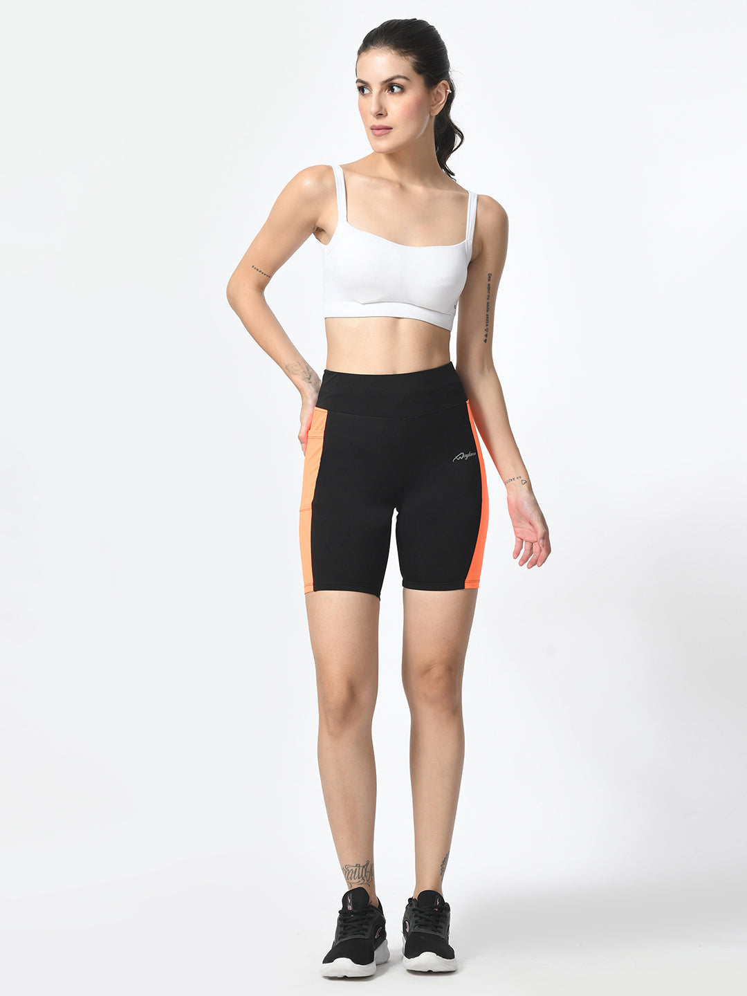 Waylene Black & Orange Colorblock High-Performance Shorts with Pocket, full front view on standing model.