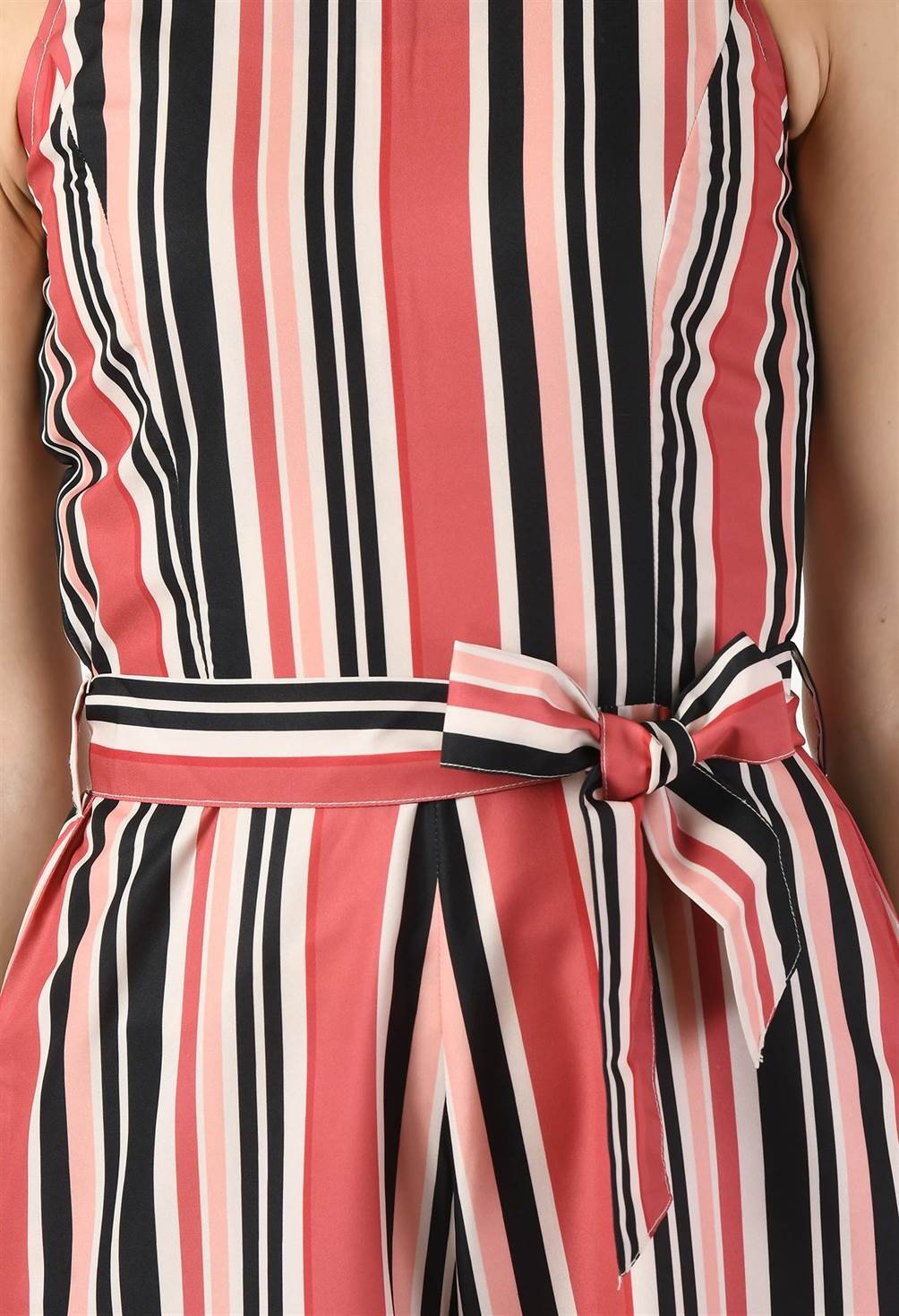 Close-up of Waylene striped multicolor jumpsuit fabric and waist tie detail.